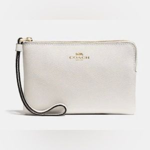 selling this white coach wristlet!